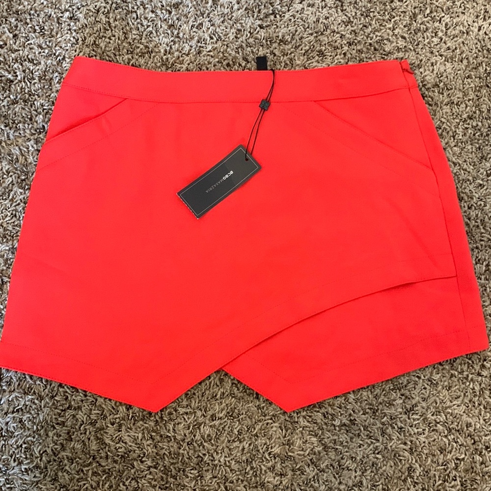 NWT Asymmetrical orange BCBGMAXAZRIA mini skirt
